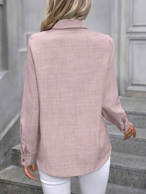 Linen-blend button-down shirt in Dusty Pink with a textured weave and button cuffs.