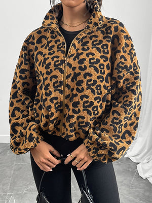 Caramel leopard print sherpa bomber jacket with zip front and high collar.