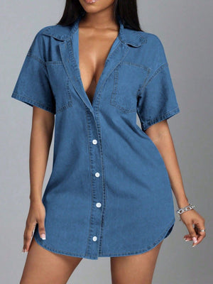 Denim shirt dress with plunge neckline, short sleeves, and button front in medium wash.