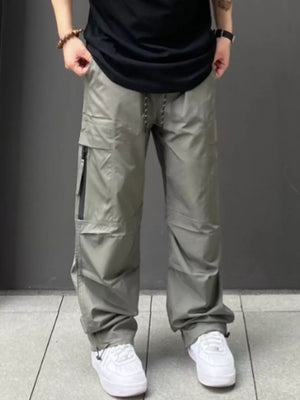 Men's Gray Green Relaxed Fit Cargo Sweatpants with ankle drawstring and zippered pocket detail.
