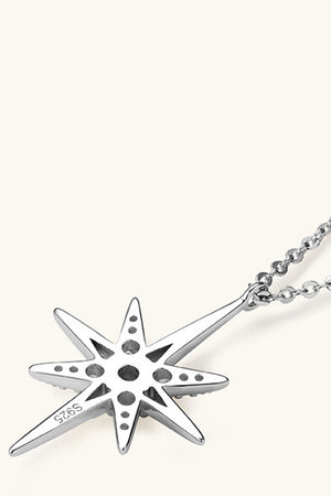 Silver celestial starburst pendant necklace with sparkling accents and S925 stamp