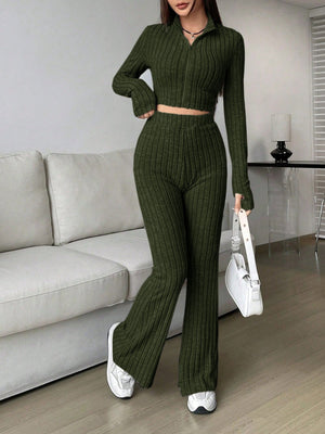 Army green ribbed knit flare co-ord set with zip-up crop top and flared pants.