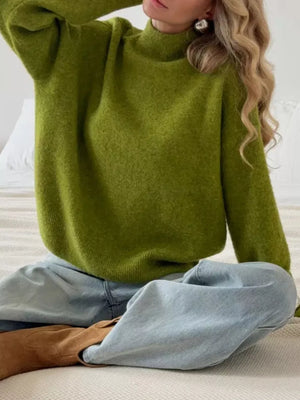 Moss green relaxed mock neck knit sweater with textured acrylic blend fabric.
