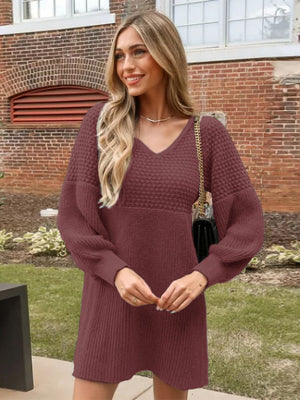 Burgundy balloon sleeve knit mini dress with textured yoke and V-neck.