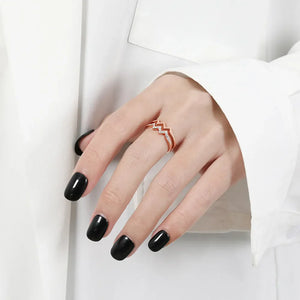 Rose gold zigzag split band ring with small clear stones