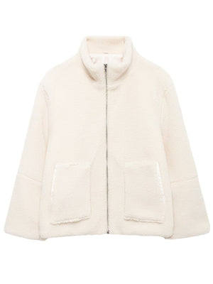 White sherpa jacket with stand collar, zip front, and two patch pockets.