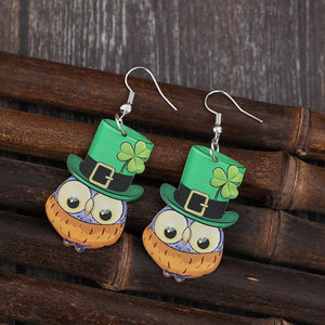 Lucky Owl acrylic dangle earrings in green with shamrock hats and alloy hooks.