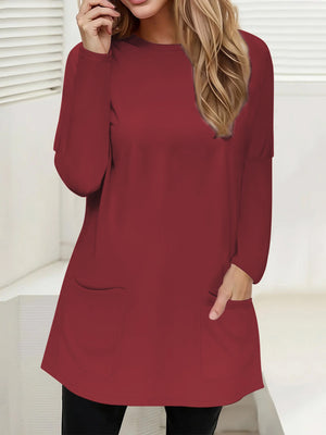 Relaxed fit burgundy tunic with long sleeves and two patch pockets.