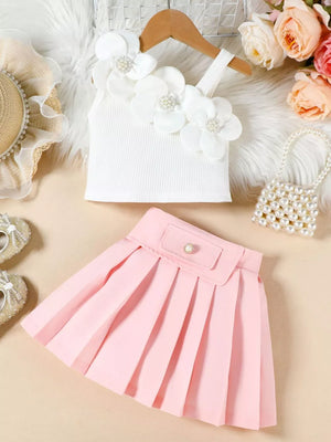 Baby girls' white floral applique tank top and pink pleated skirt outfit.
