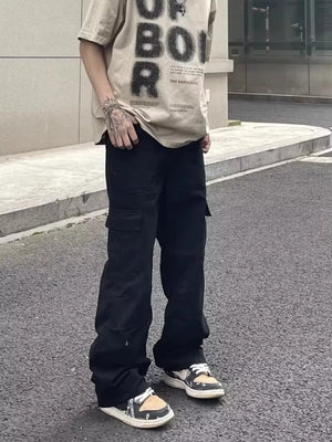Men's black relaxed fit cotton cargo pants with multiple pockets.