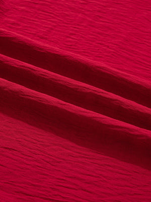 Deep red braided V-neck blouse with textured fabric detail
