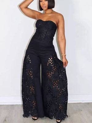 Black lace cutout tube top and wide-leg pants set with airy details.
