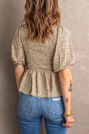 Floral smocked bodice peplum top with puff sleeves