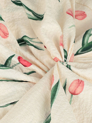 Cream midi dress with pink tulip print and twist front detail