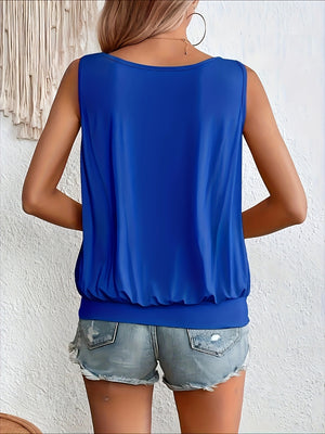 Royal blue gathered front tank top with elastic hem, worn with denim shorts.