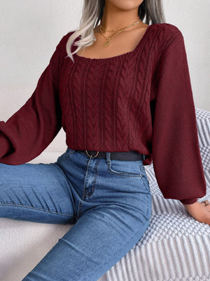 Wine cable knit sweater with square neckline and balloon sleeves.