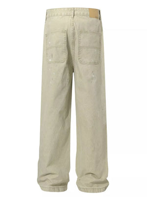 Apricot loose fit sweatpants with ink-splash detail and back pockets.