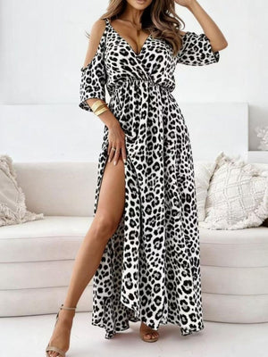 White leopard print cold shoulder maxi dress with high slit and V-neck.