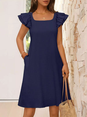 Navy blue a-line dress with ruffled cap sleeves and square neckline, featuring pockets.