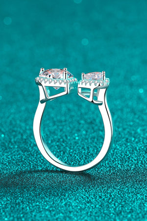 Double Heart Halo Ring in silver sterling silver with two halo-set cubic zirconia stones.