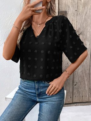 Black Swiss dot blouse with V-neck and short sleeves