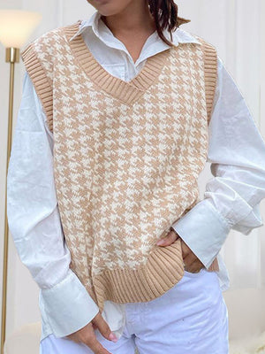 Houndstooth knit v-neck tank in beige and white, layered over a white shirt.
