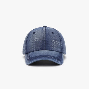 Denim patchwork baseball cap with contrast stitching and mesh back panel.
