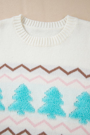 White knit sweater with textured tree motif and chevron pattern.