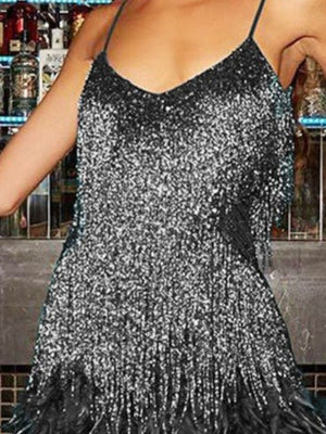 Black sequin mini dress with fringe and feather trim.