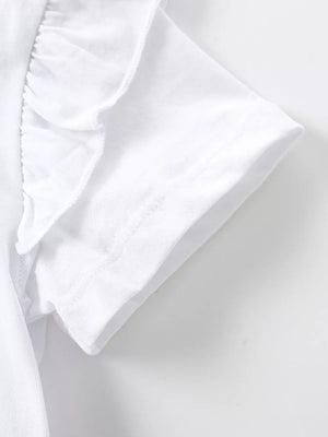 White baby dress with ruffled cap sleeves and cotton fabric detail.