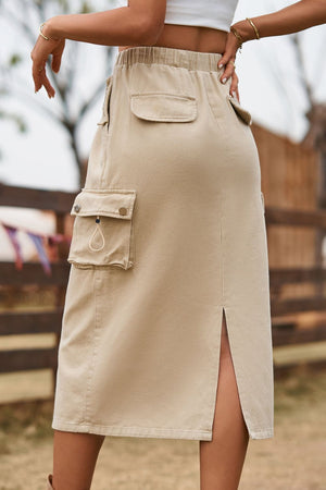 Tan midi skirt with drawstring waist, cargo pockets, and side slit.