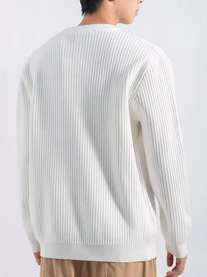 Men's white ribbed knit crewneck sweatshirt with button details on shoulder.