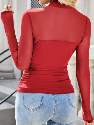 Deep red sheer mesh patchwork high neck long sleeve maternity blouse with ruched sides.
