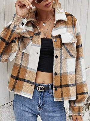 Camel plaid shacket with contrast collar, buttoned front, and chest pockets.