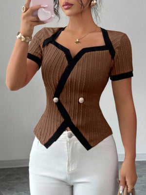 Sophisticated brown t-shirt with contrast trim, button detail, and asymmetrical hem.
