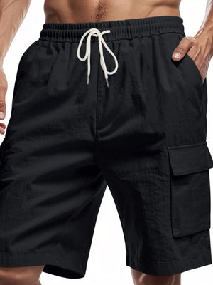 Black cargo shorts with drawstring waist and utility pockets.