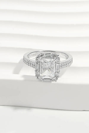 Radiant Emerald Cut Halo Ring in silver with pave band and center stone.