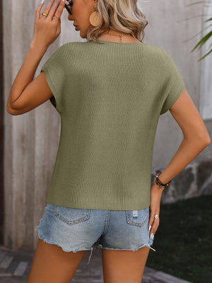 Sage ribbed knit tee with short sleeves and a V-neck, styled with denim shorts.