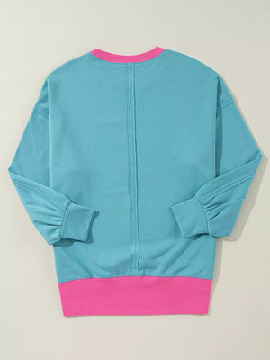 Colorblock Patchwork Crew Neck Sweatshirt in Teal, close-up detail
