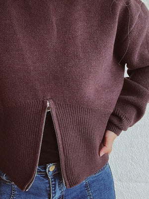 Ribbed hemline zip-front knit top in chocolate brown with a silver zipper detail.