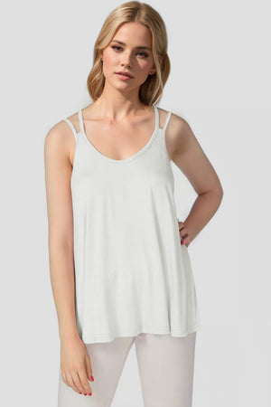 White double strap trapeze cami with a V-neckline and flowing silhouette.