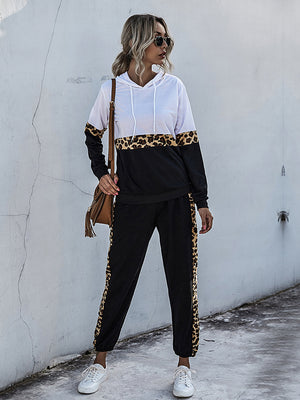Leopard trim colorblock loungewear set in white and black with a hooded top and joggers.