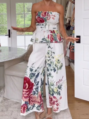 Floral print ruched strapless peplum top and wide-leg pants set.