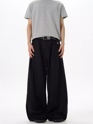 Black relaxed fit pleated men's sweatpants with a casual, comfortable style.