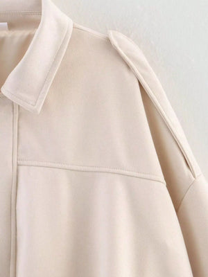 Off-white oversized zip-up jacket with a collar and shoulder detail