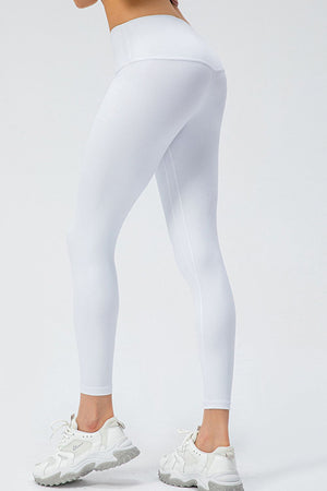 White high-rise performance leggings with a sculpted fit and seamless detail.