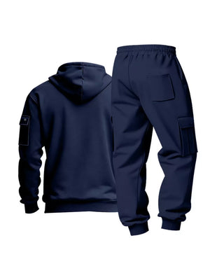 Navy blue men's hoodie and cargo sweatpants set with pocket details.