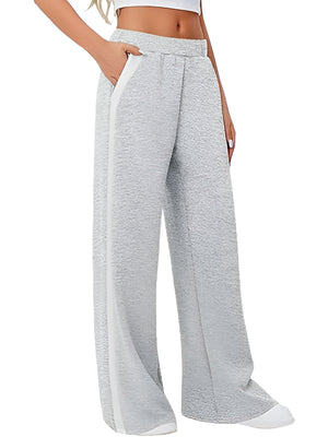 Light gray palazzo trousers with contrast side panel and textured fabric.