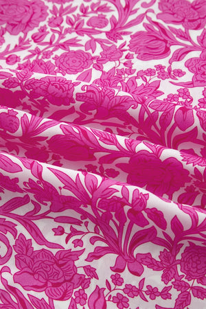 Vibrant floral print midi dress with ruffle sleeves in pink and white.