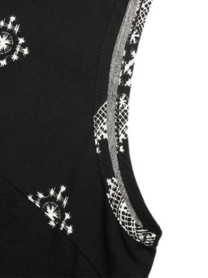 Black sleeveless top with white geometric print and contrast trim detail.